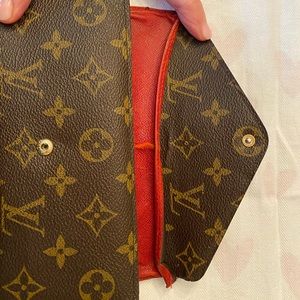 Used Louis Vuitton's classic wallet Monogram canvas grained-leather lining